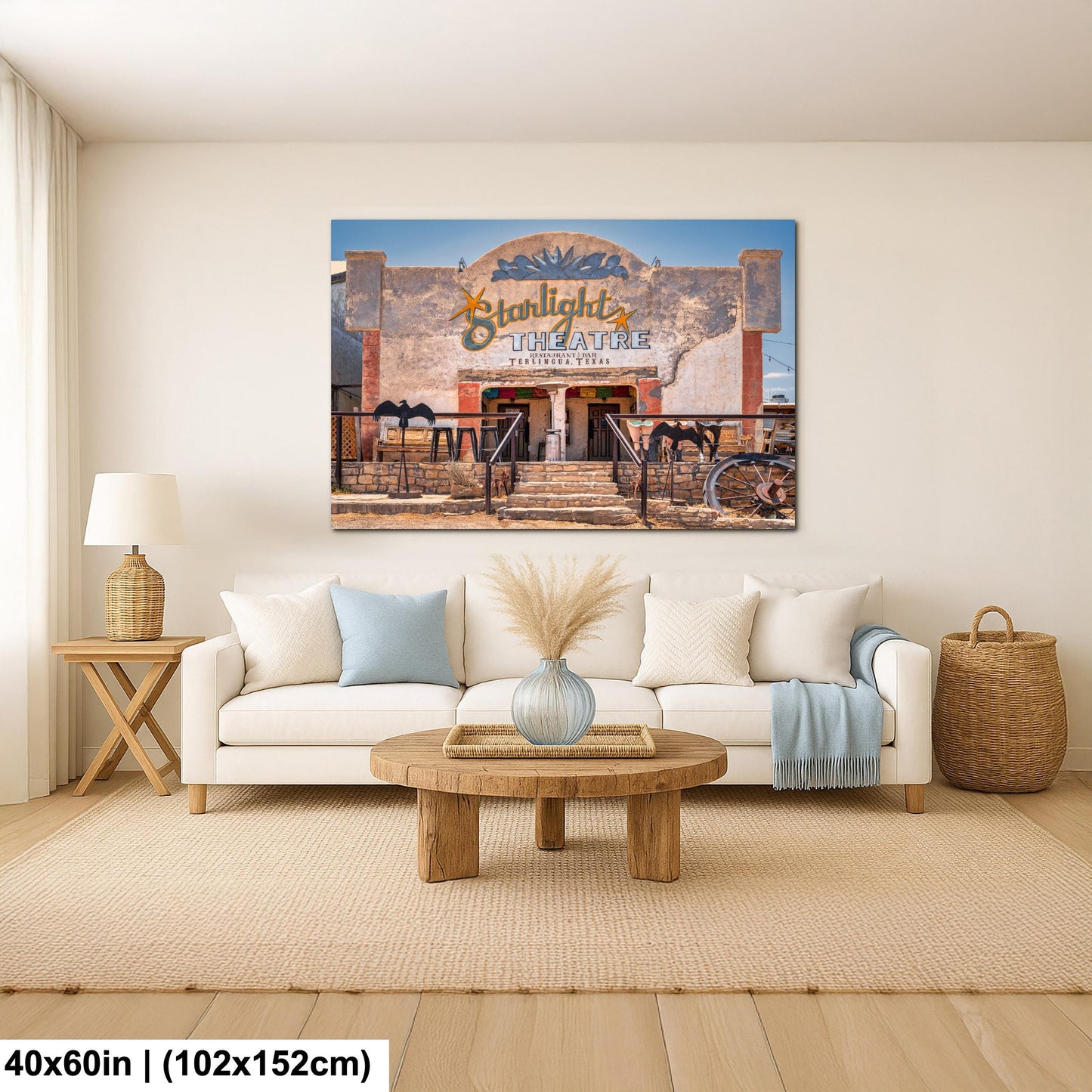 a theater with a sign that reads "Starlight Theatre" and a bicycle in front of the entrance.